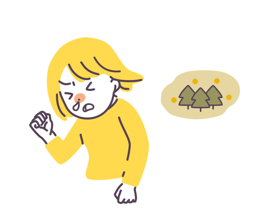花粉症でくしゃみをする女性